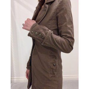 Brown structured trench coat.
